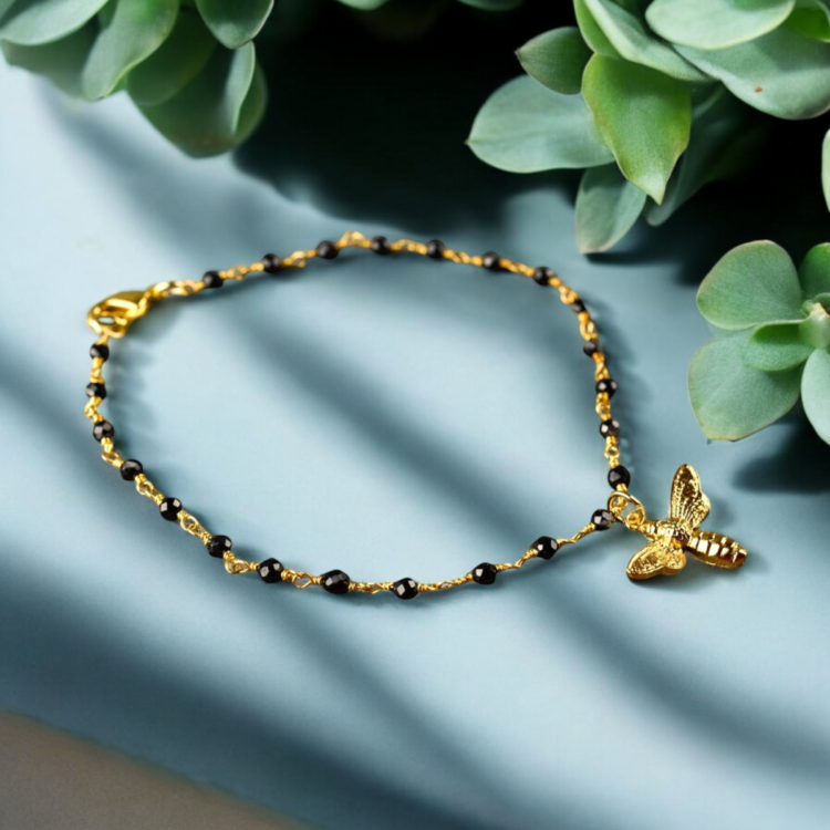 Gold bumblebee bracelet with onyx - gemstone bracelet with delicate bee pendant