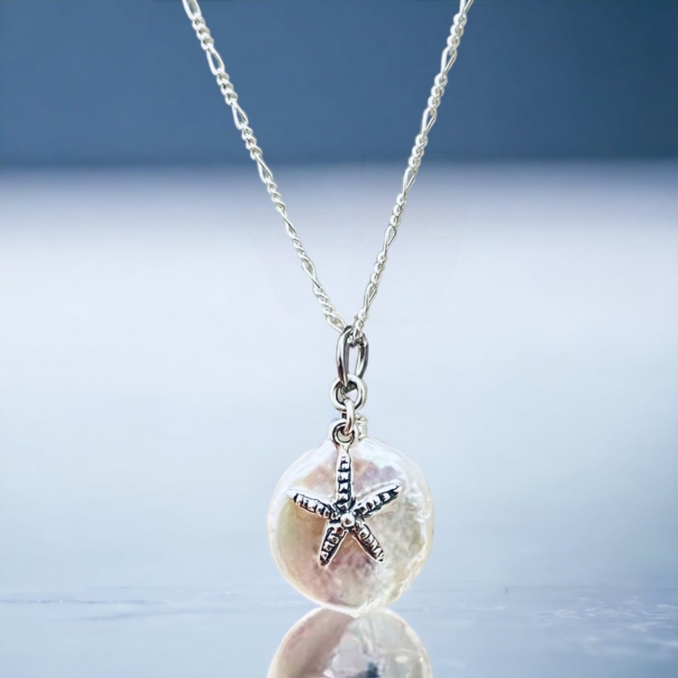 Radiant joy of life - 925 sterling silver necklace with mother-of-pearl disc and starfish pendant